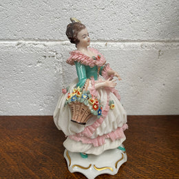 Dresden Figurine of Lady Holding Basket of Flowers