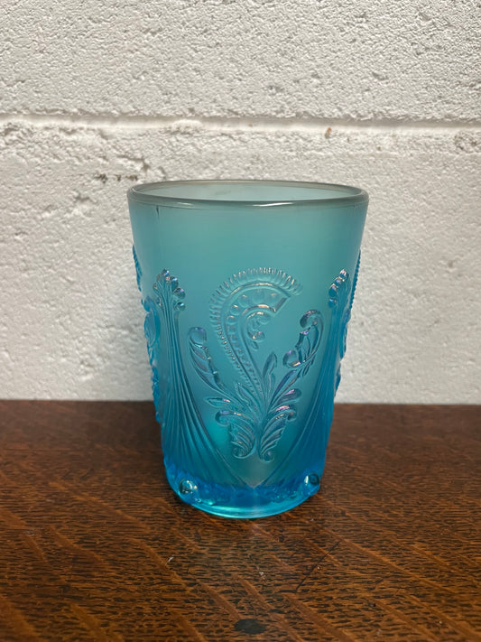 Beautiful ice blue Carnival Glass tumbler cup. Stamped underneath and in good original condition. Please view photos as they help form part of the description.&nbsp;