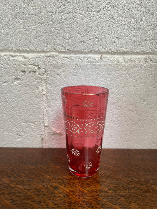 Antique Ruby glass cup with beautiful enameling decoration. Sourced locally and in good original condition. Please view photos as they help form part of the description and condition.&nbsp;