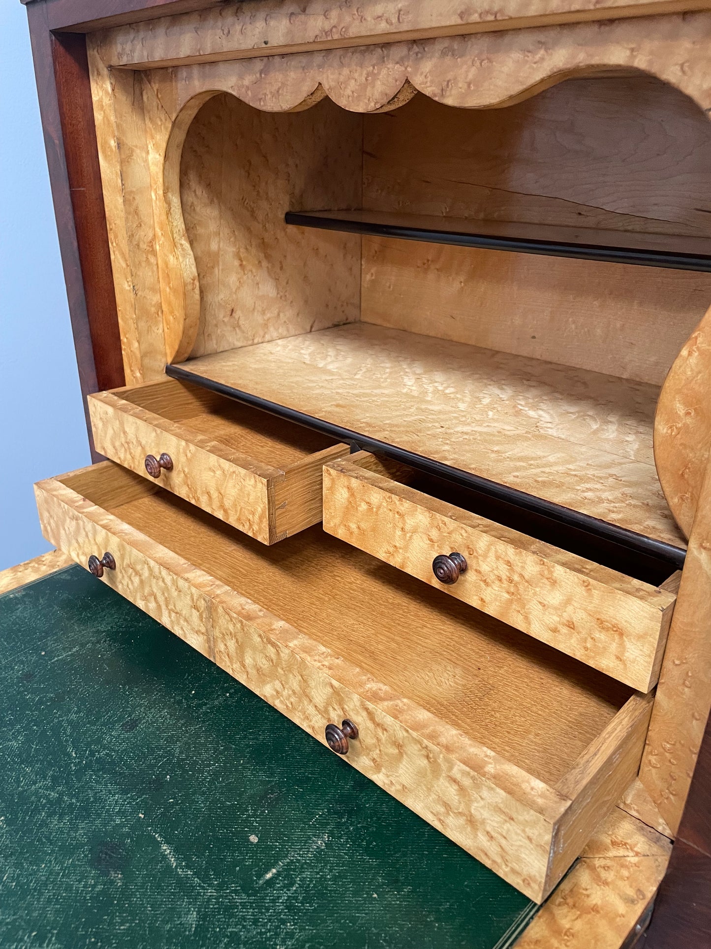 Early 19th Century Louis Phillipe style flame mahogany secretaire drawers. Presents as a seven drawer chest however three drawers are a drop down panel to a beautifully fitted secretaire/desk area. Sourced directly from France and in good original condition especially for its age. 