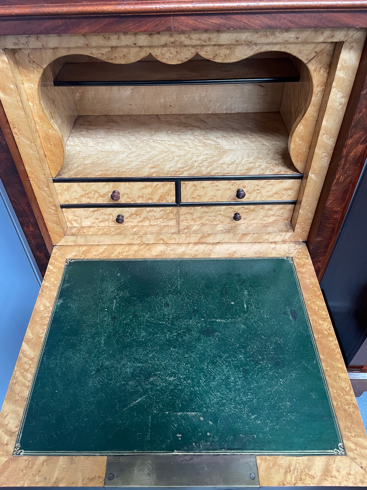 Early 19th Century Louis Phillipe style flame mahogany secretaire drawers. Presents as a seven drawer chest however three drawers are a drop down panel to a beautifully fitted secretaire/desk area. Sourced directly from France and in good original condition especially for its age. 