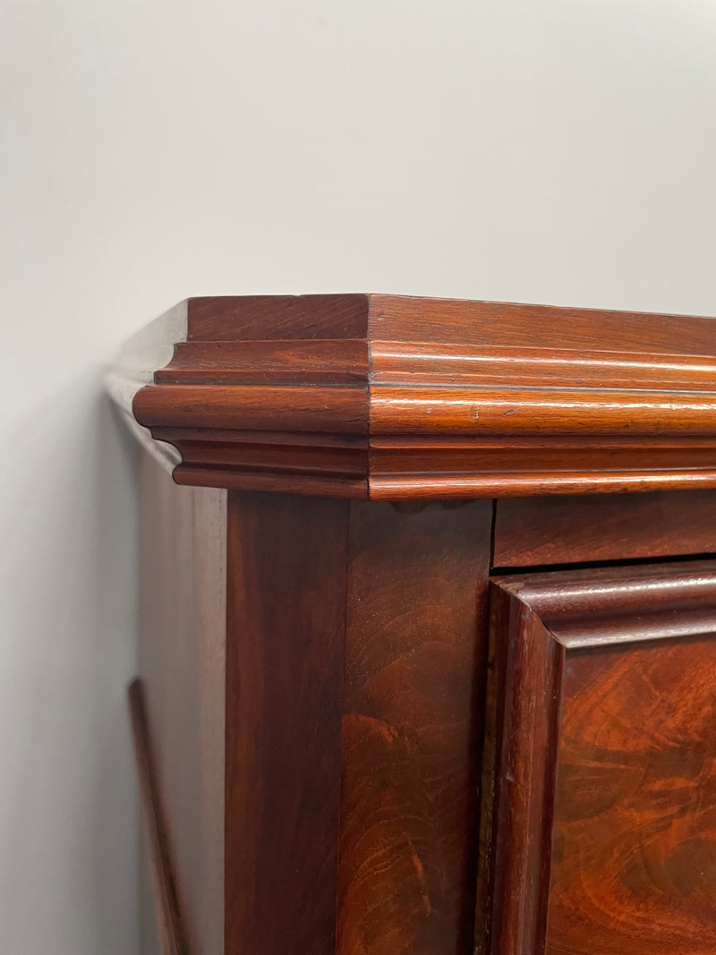 Early 19th Century Louis Phillipe style flame mahogany secretaire drawers. Presents as a seven drawer chest however three drawers are a drop down panel to a beautifully fitted secretaire/desk area. Sourced directly from France and in good original condition especially for its age. 