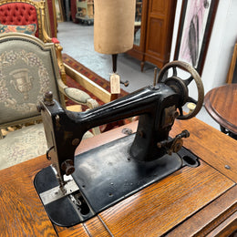 Antique Sewing Machine In Oak Case