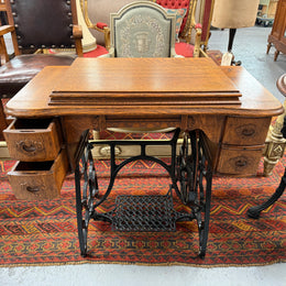 Antique Sewing Machine In Oak Case