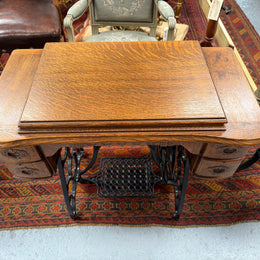 Antique Sewing Machine In Oak Case