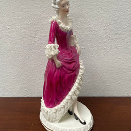 Beautiful English Staffordshire bone china lady figurine with lace. It is in good vintage condition. Please view photos as they help form part of the description.