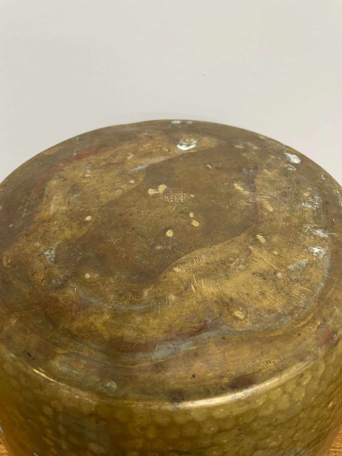 English brass decorative planter pot marked made in England on the base. In good vintage condition.