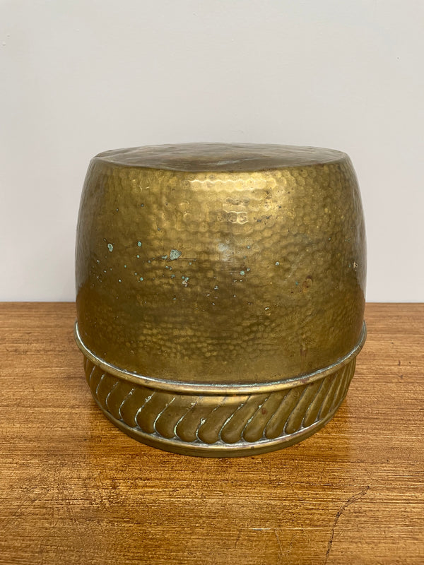 English brass decorative planter pot marked made in England on the base. In good vintage condition.