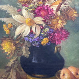 Gorgeous vintage floral oil painting in beautiful colours and a ornate gold frame. Signed by the artist and in good original detailed condition. It has been sourced from France. 