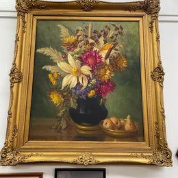 Gorgeous vintage floral oil painting in beautiful colours and a ornate gold frame. Signed by the artist and in good original detailed condition. It has been sourced from France. 