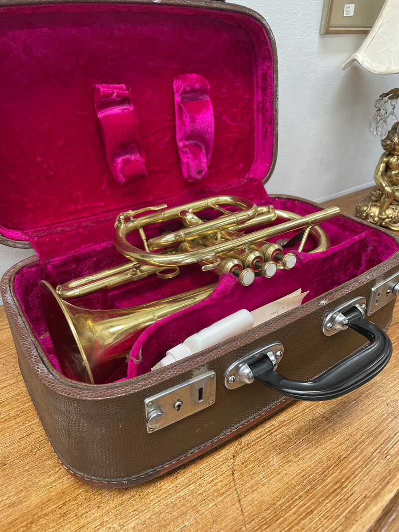 Lovely Vintage Lark Coronet in its original case. With a lovely bright interior to case and handle for carrying. In good condition with paperwork included. 