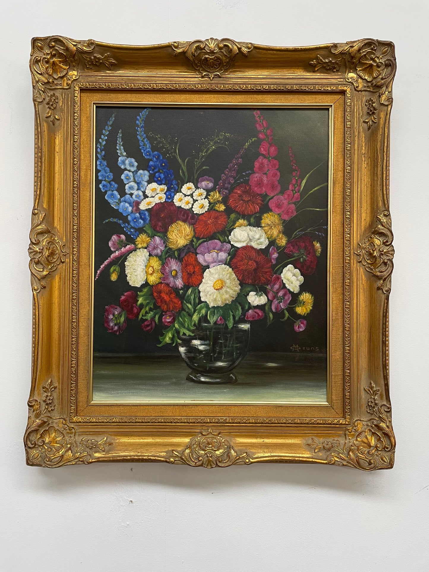Very pretty oil on canvas painting of flowers in a vase in the most beautiful colours. Signed by the artist and framed in a ornate gilt frame. Ready to hang. Sourced directly from France and in good original condition. 