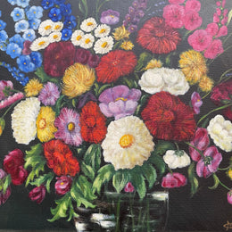 Very pretty oil on canvas painting of flowers in a vase in the most beautiful colours. Signed by the artist and framed in a ornate gilt frame. Ready to hang. Sourced directly from France and in good original condition. 