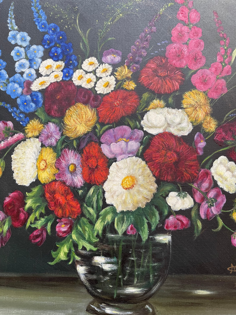 Very pretty oil on canvas painting of flowers in a vase in the most beautiful colours. Signed by the artist and framed in a ornate gilt frame. Ready to hang. Sourced directly from France and in good original condition. 