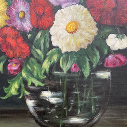Very pretty oil on canvas painting of flowers in a vase in the most beautiful colours. Signed by the artist and framed in a ornate gilt frame. Ready to hang. Sourced directly from France and in good original condition. 