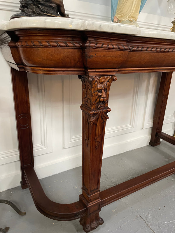 Fabulous French Henry II marble top console table with carved details. It is in good original condition. Please see the photos as they form part of the description.