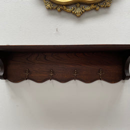 Charming French oak four Cherub shaped hook coat rack with shelf. Sourced from France and is in good original condition.