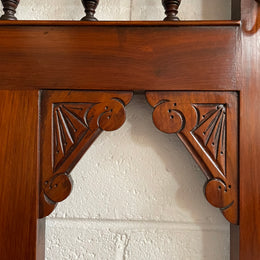 Lovely Edwardian single drawer shield mirror mahogany hall stand. It has 6 hooks for hanging and two pretty decorative blue and white tiles. In good original condition
