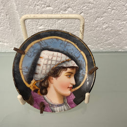Antique miniature hand painted dish of a woman in profile. In good original condition.  Please see photos as they form part of the description.