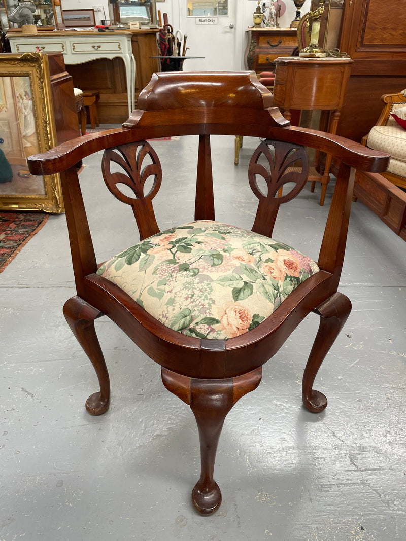 Charming mahogany upholstered seat corner chair with pretty floral fabric. Sourced locally and in good original condition.