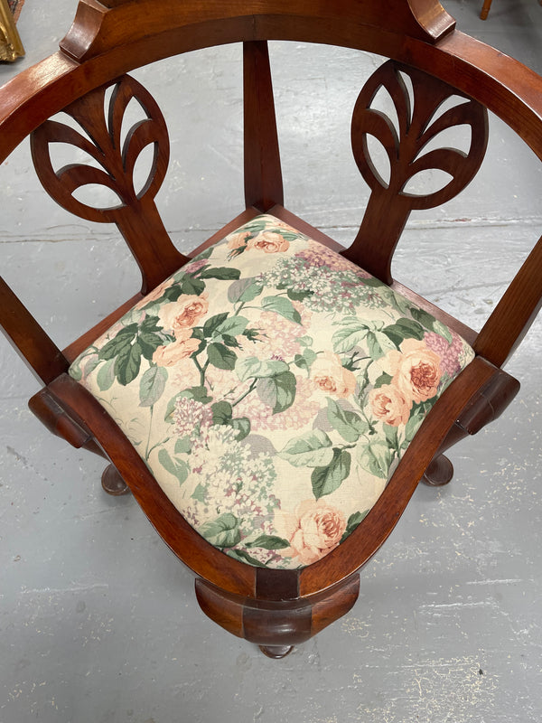 Charming mahogany upholstered seat corner chair with pretty floral fabric. Sourced locally and in good original condition.