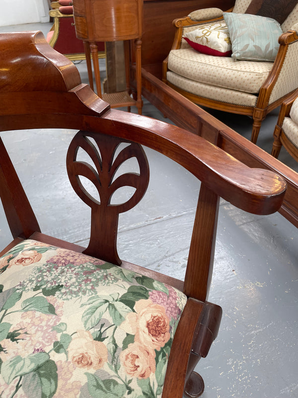 Charming mahogany upholstered seat corner chair with pretty floral fabric. Sourced locally and in good original condition.