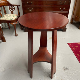 Practical round Arts and Crafts side table stained in a mahogany colour. Sourced locally and in good original condition. Please see all photos as they form part of the description and condition.