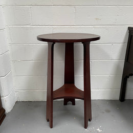 Practical round Arts and Crafts side table stained in a mahogany colour. Sourced locally and in good original condition. Please see all photos as they form part of the description and condition.