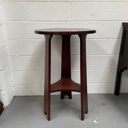 Practical round Arts and Crafts side table stained in a mahogany colour. Sourced locally and in good original condition. Please see all photos as they form part of the description and condition.