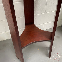 Practical round Arts and Crafts side table stained in a mahogany colour. Sourced locally and in good original condition. Please see all photos as they form part of the description and condition.