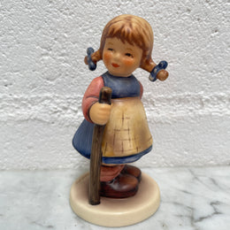 Lovely Vintage Goebel Hummel figurine #768 of a Pixie girl with a walking Stick. Stamped Susser Fratz 1994 and in good original condition. Please see photos as they form part of the description.