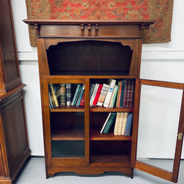 Practical Arts and Crafts <span data-mce-fragment="1"> bookcase featuring two glass doors and three fixed shelves. Perfect for organizing your books or showcasing your favorite pieces, this bookcase also includes a top shelf for additional display space. I</span>t has been sourced locally and is in good original condition.
