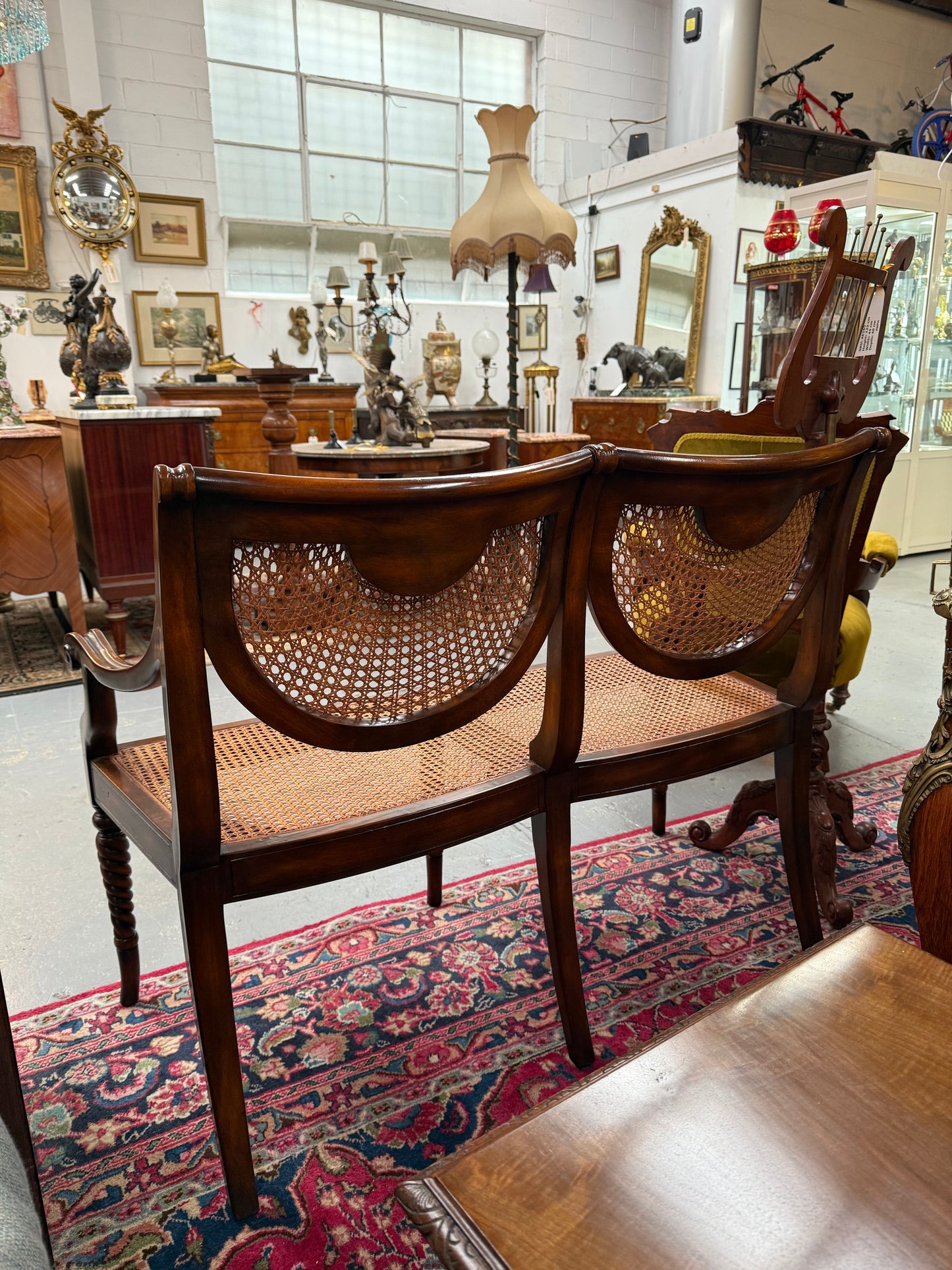 Regency Style Cane and Mahogany Settee