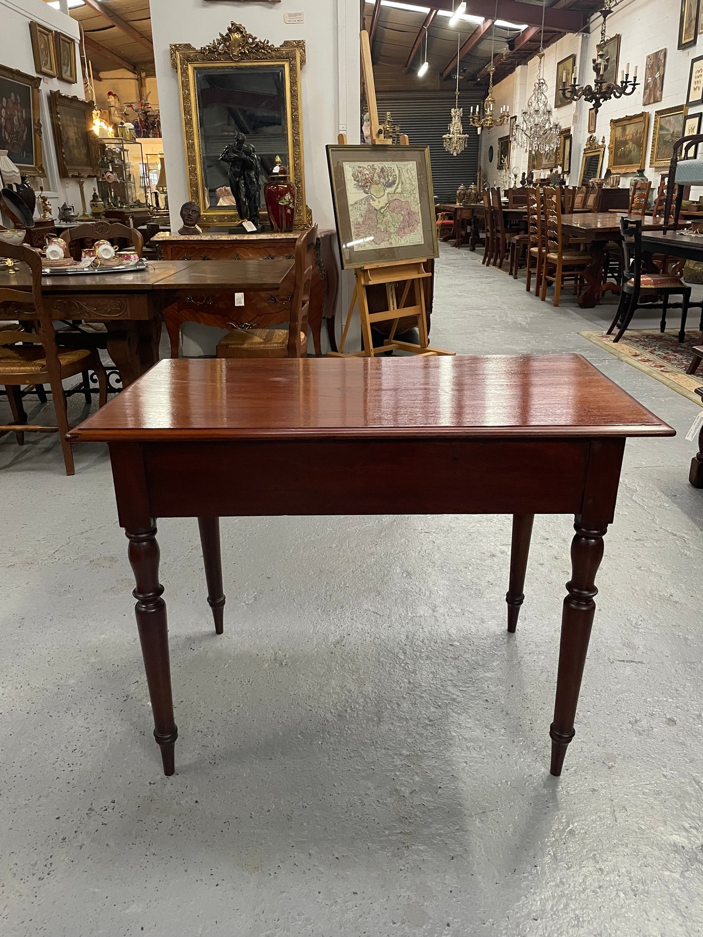 This beautiful Victorian Cedar table would be ideal as a console/side table or as a small desk. It features beautiful turned legs and a drawer for storage. Sourced locally it is in good original detailed condition.