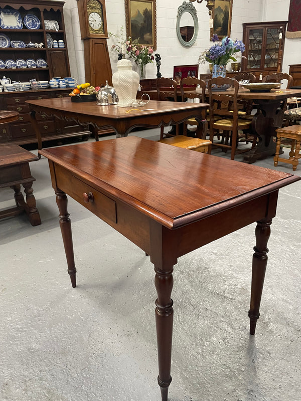 This beautiful Victorian Cedar table would be ideal as a console/side table or as a small desk. It features beautiful turned legs and a drawer for storage. Sourced locally it is in good original detailed condition.