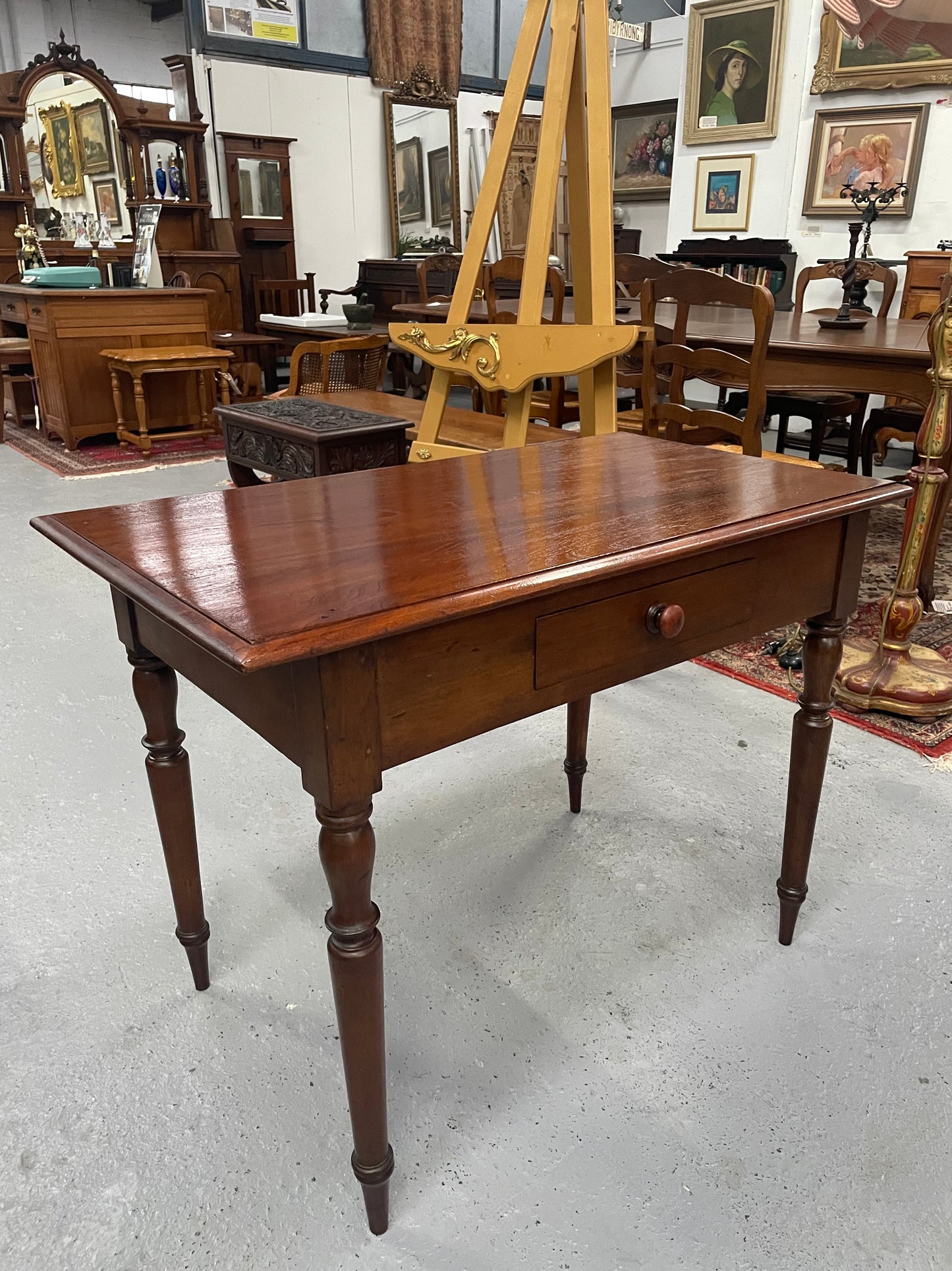 This beautiful Victorian Cedar table would be ideal as a console/side table or as a small desk. It features beautiful turned legs and a drawer for storage. Sourced locally it is in good original detailed condition.