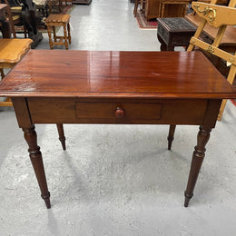 This beautiful Victorian Cedar table would be ideal as a console/side table or as a small desk. It features beautiful turned legs and a drawer for storage. Sourced locally it is in good original detailed condition. 