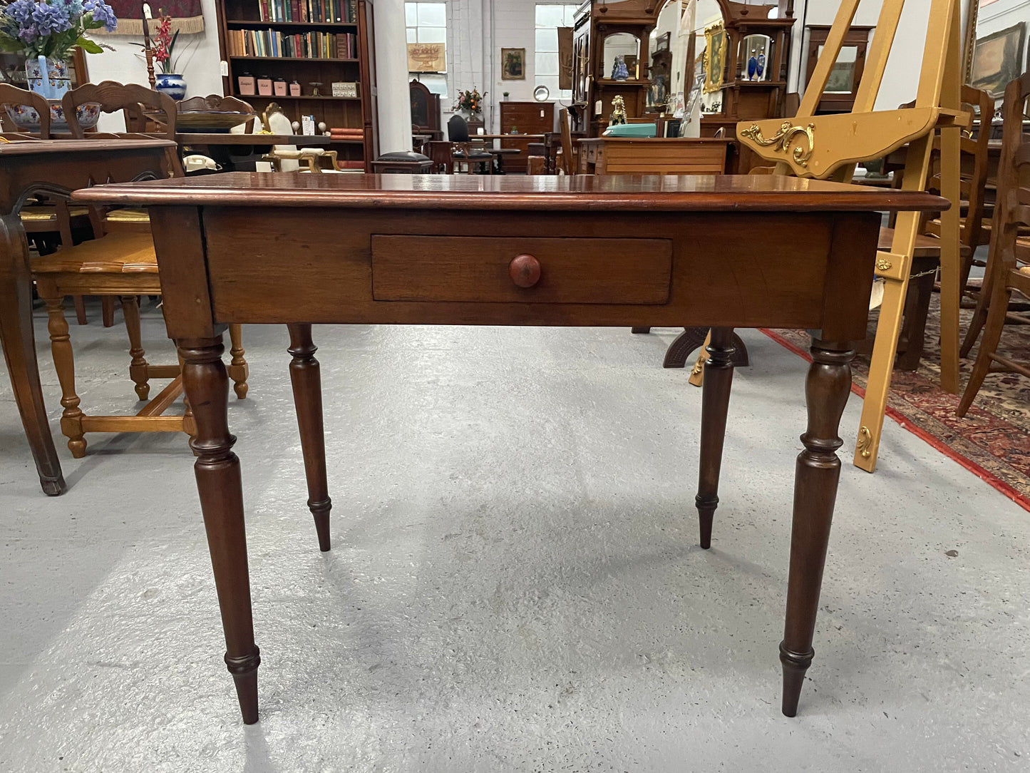 This beautiful Victorian Cedar table would be ideal as a console/side table or as a small desk. It features beautiful turned legs and a drawer for storage. Sourced locally it is in good original detailed condition.