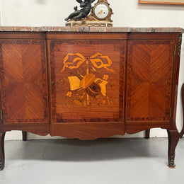 Antique late 19th century Transitional style marble top cabinet featuring beautiful marquetry inlay and decorative mounts. In good original detailed condition. 