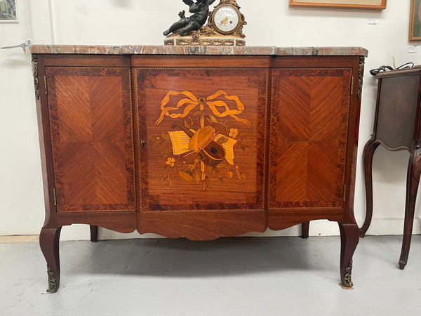 Antique late 19th century Transitional style marble top cabinet featuring beautiful marquetry inlay and decorative mounts. In good original detailed condition. 