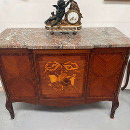 Antique late 19th century Transitional style marble top cabinet featuring beautiful marquetry inlay and decorative mounts. Made from French Walnut and Burr Walnut. In good original detailed condition. 