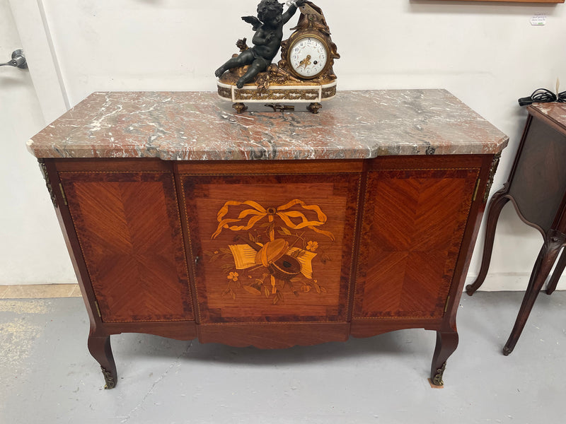 Antique late 19th century Transitional style marble top cabinet featuring beautiful marquetry inlay and decorative mounts. Made from French Walnut and Burr Walnut. In good original detailed condition. 