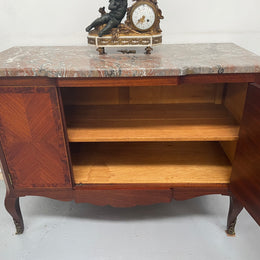 Antique late 19th century Transitional style marble top cabinet featuring beautiful marquetry inlay and decorative mounts. In good original detailed condition. 