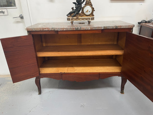 Antique late 19th century Transitional style marble top cabinet featuring beautiful marquetry inlay and decorative mounts. In good original detailed condition. 