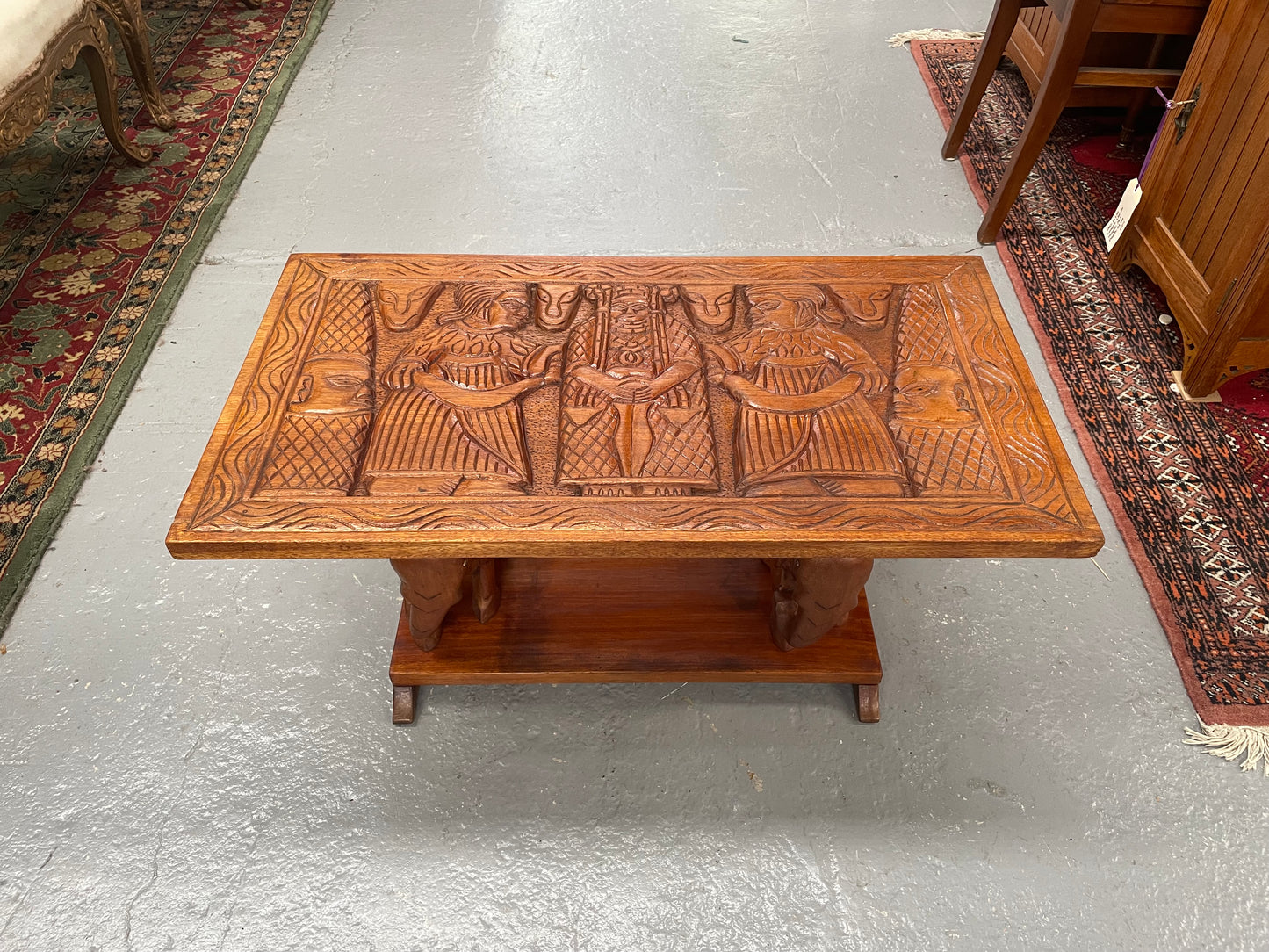 Vintage Hand Carved Teak Coffee Table Featuring Elephants