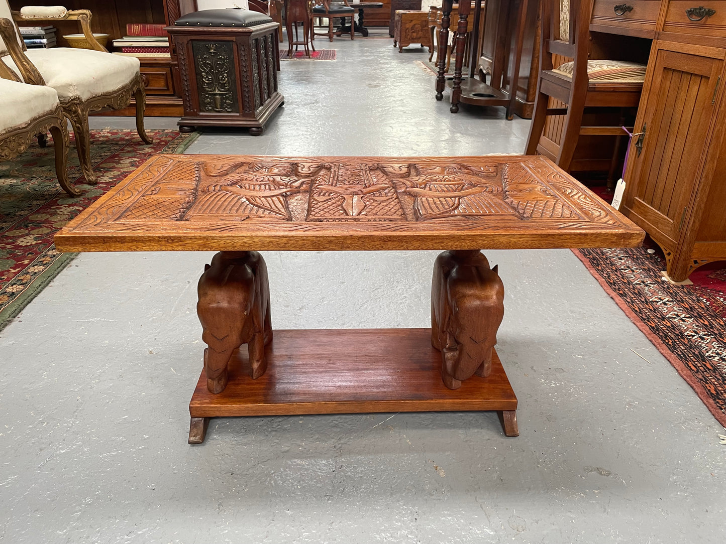 Vintage Hand Carved Teak Coffee Table Featuring Elephants