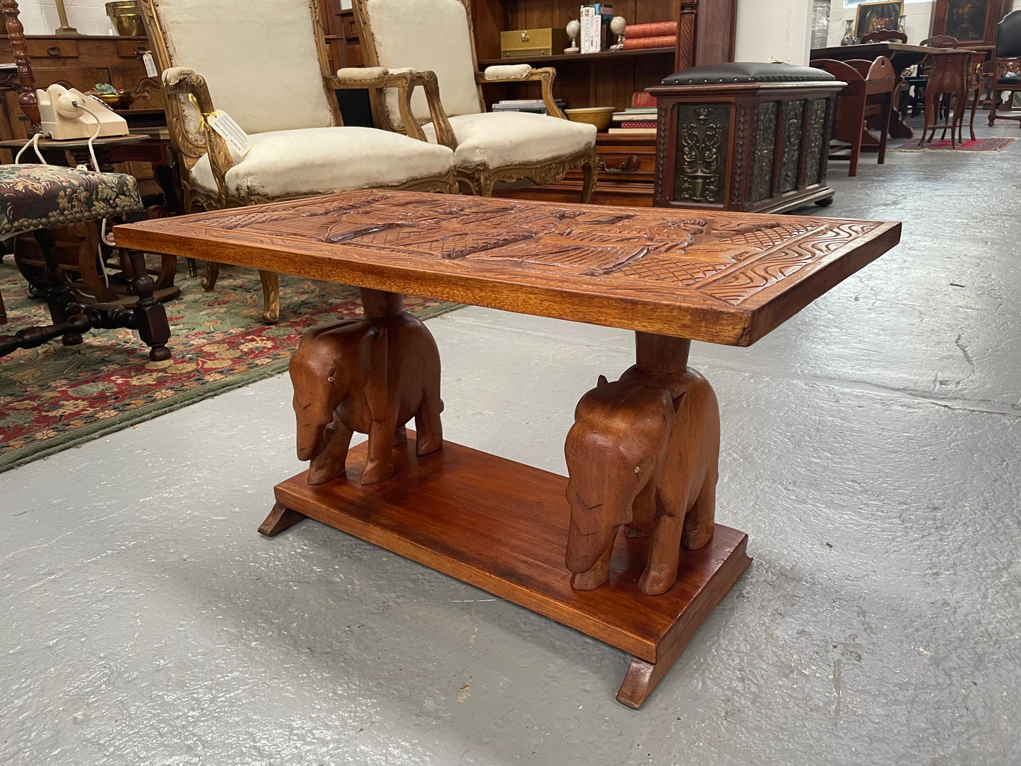 Vintage Hand Carved Teak Coffee Table Featuring Elephants