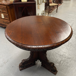Antique French Oak renaissance style round centre table. Featuring amazing detailed carving to base and throughout. Sourced from France and in good original detailed condition.