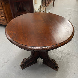 Antique French Oak renaissance style round centre table. Featuring amazing detailed carving to base and throughout. Sourced from France and in good original detailed condition.