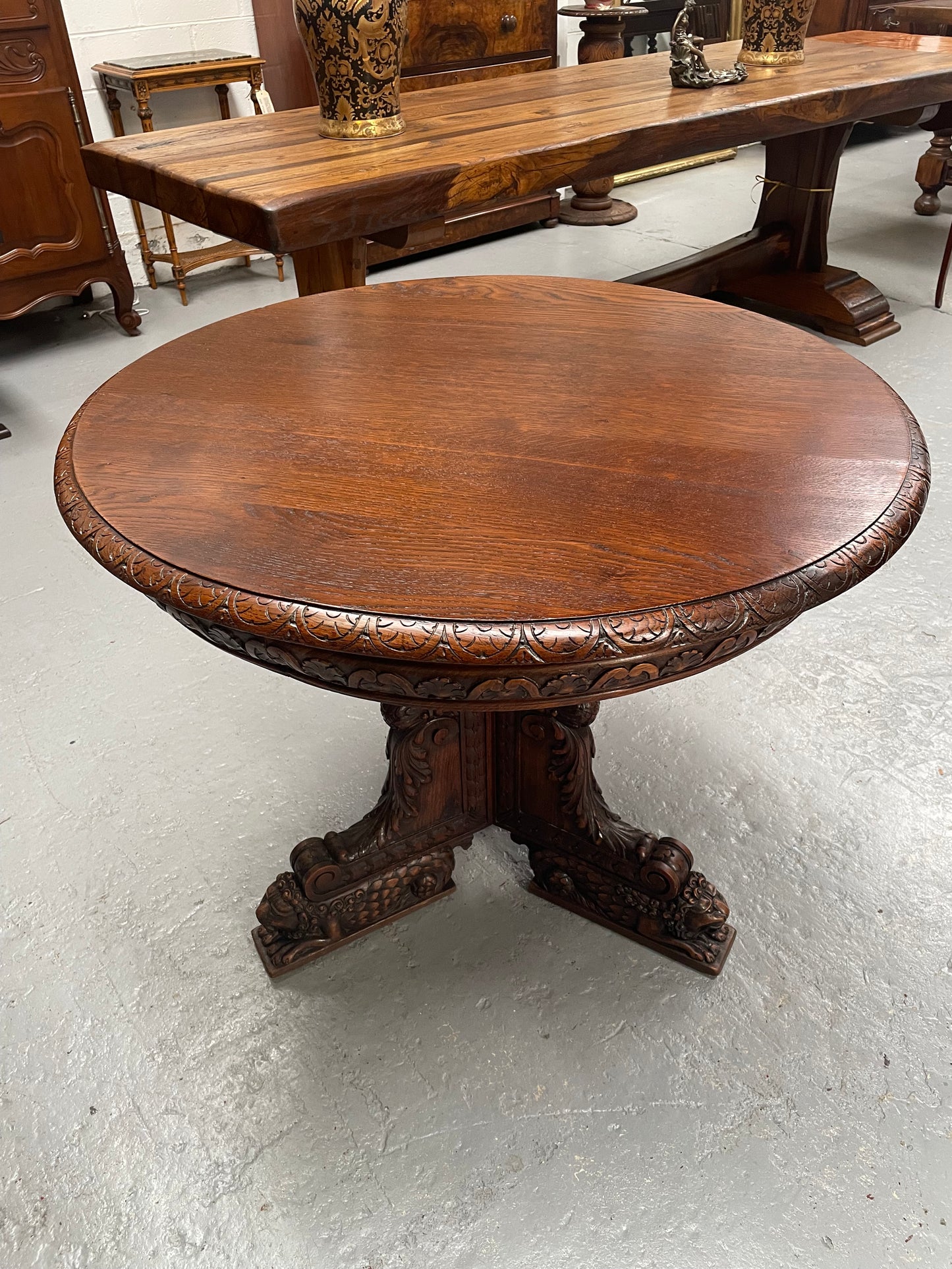 Antique French Oak renaissance style round centre table. Featuring amazing detailed carving to base and throughout. Sourced from France and in good original detailed condition.